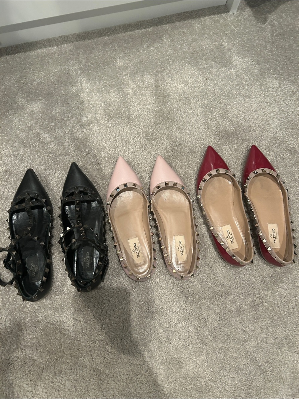 Valentino Garavani Rockstud Pointed-Toe Flats in Black, Blush, and Red